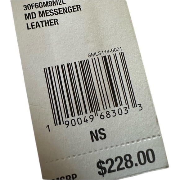 Michael Kors pebbled leather mini messenger bag. In black - Picture 4 of 4